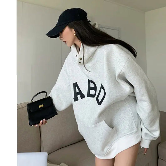 Sudadera con Capucha Estampada y Holgada
